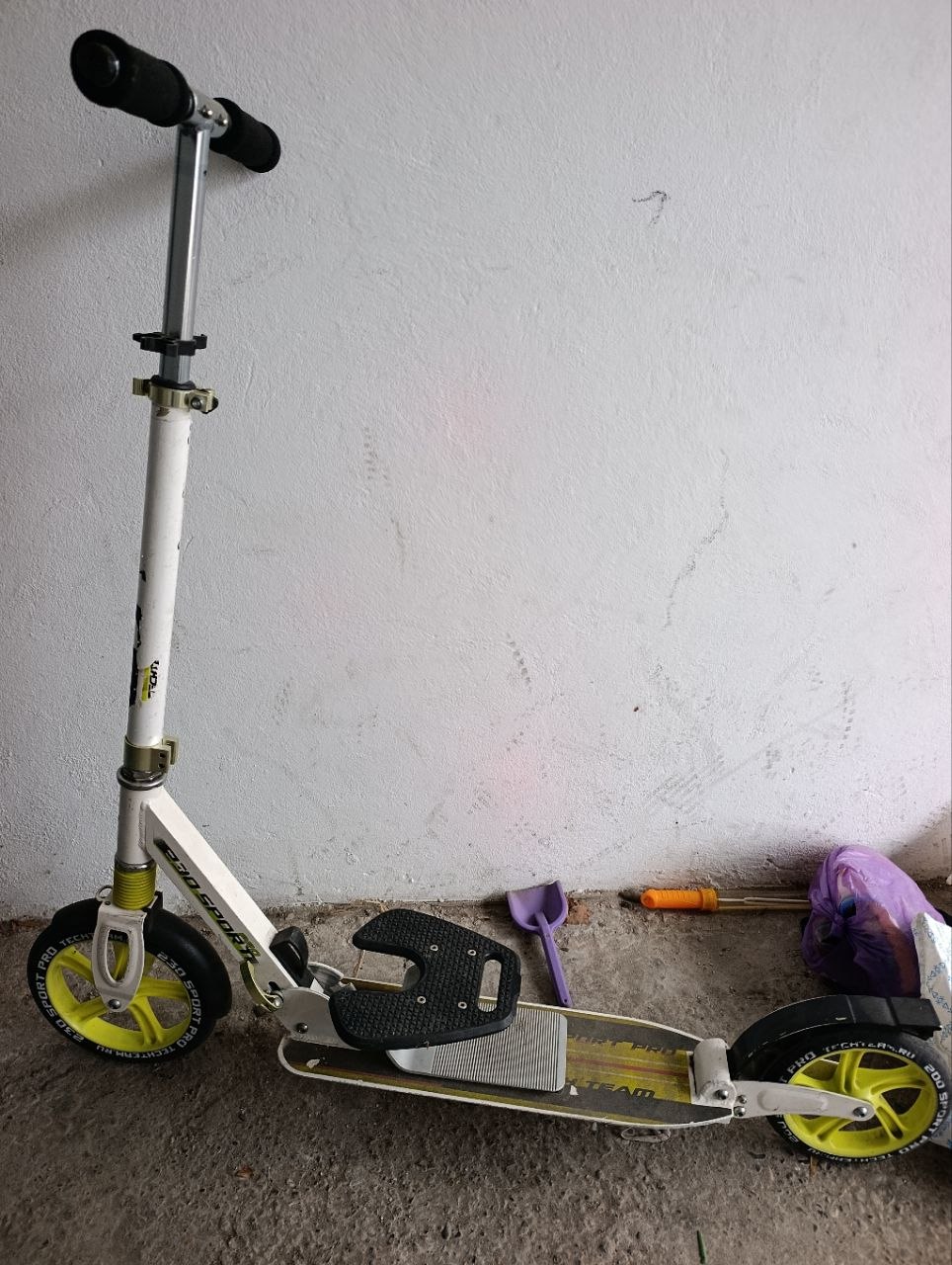 Scooter with kickstand, average condition. — photo