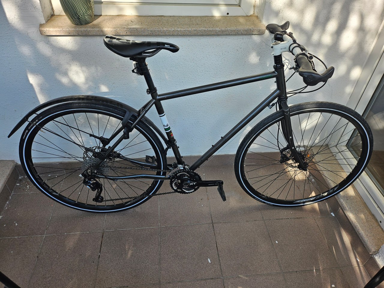 Bike Fuji Reynolds 520 Chrome-Moly Touring (M/54 cm) with full set Shimano DeoreXT 3x10 speed, Randonneur Vittoria wheels (700c), detachable front and rear wheels, racing saddle — photo