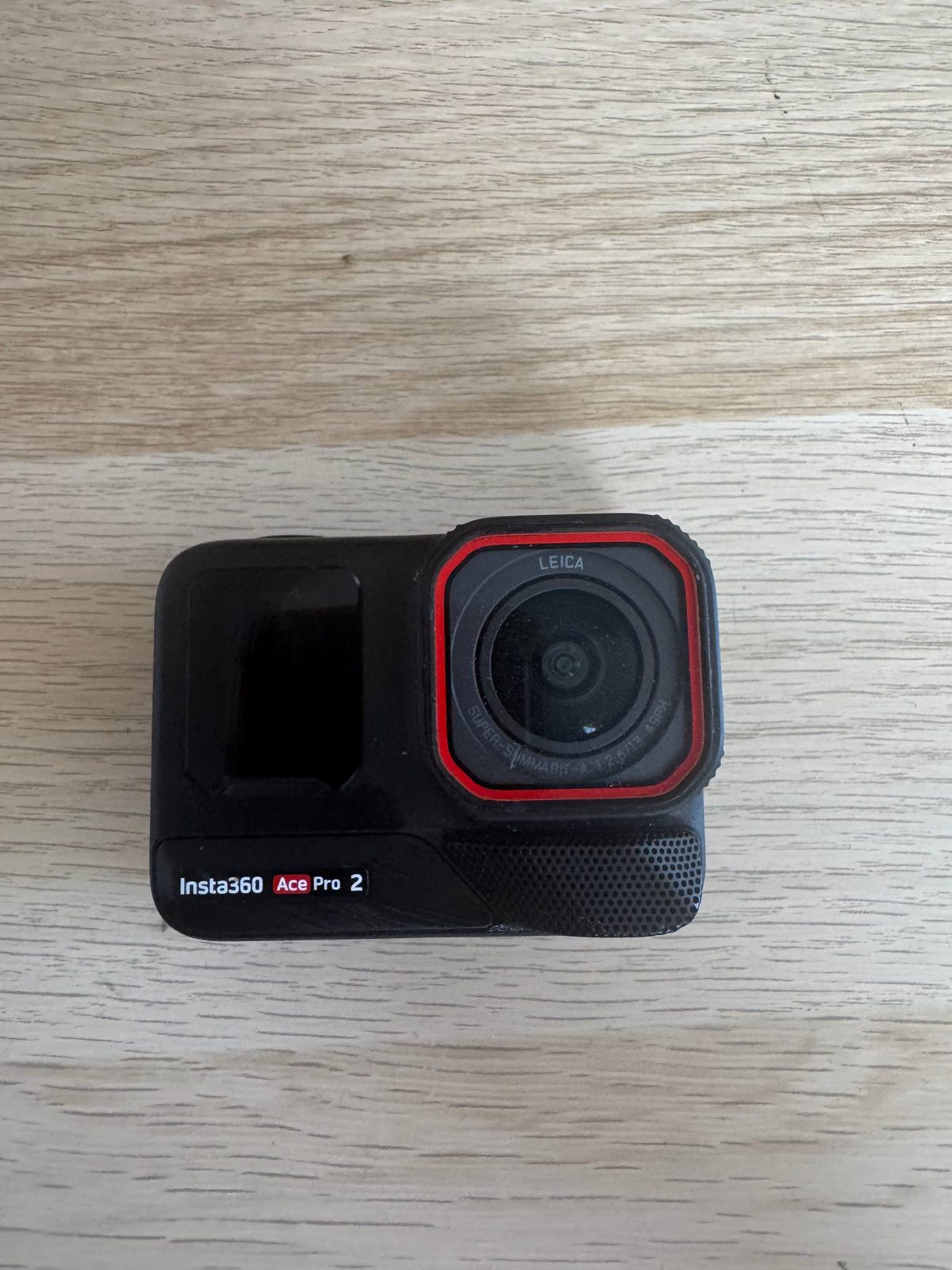 I am selling an insta ace pro 2 action camera with a 128GB memory card. — photo